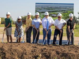 Break ground at the new sports complex